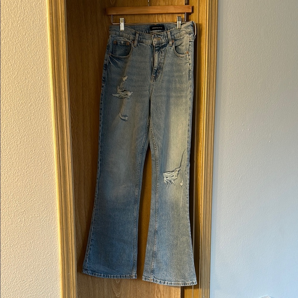 Distressed Blue Jeans